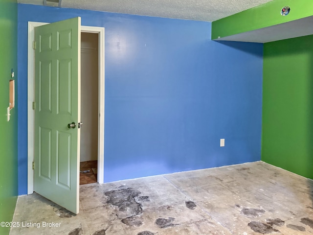 599 Ritchie Dr, Brandenburg, KY 40108 - unfurnished room featuring a textured ceiling