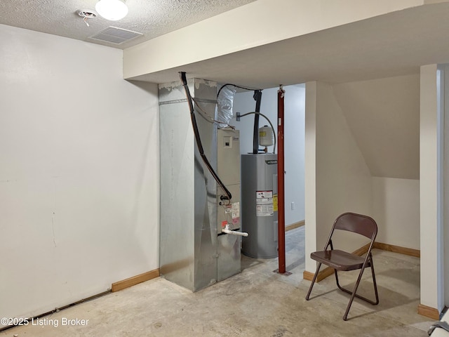 599 Ritchie Dr, Brandenburg, KY 40108 - finished below grade area with electric water heater, heating unit, and a textured ceiling