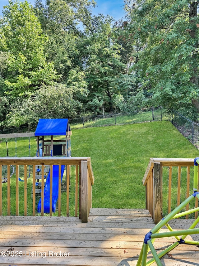 599 Ritchie Dr, Brandenburg, KY 40108 - wooden deck with a playground