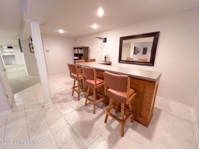4212 Marseille Dr, Louisville, KY 40272 - bar area with recessed lighting and light tile patterned floors