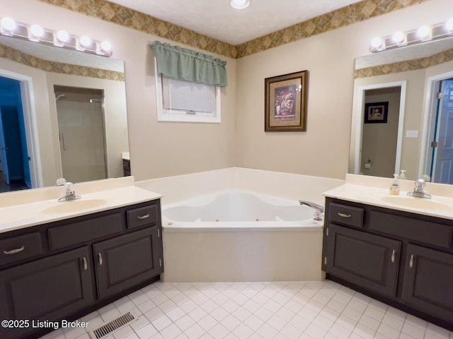 4212 Marseille Dr, Louisville, KY 40272 - full bathroom featuring two vanities, a tub with jets, tile patterned flooring, and a shower stall