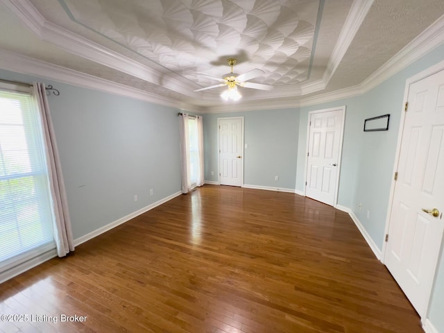 4212 Marseille Dr, Louisville, KY 40272 - unfurnished room featuring a raised ceiling, plenty of natural light, hardwood / wood-style flooring, ceiling fan, and ornamental molding