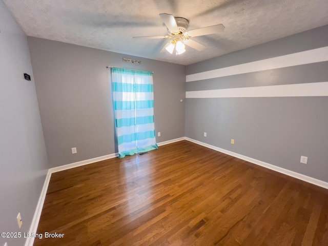 4212 Marseille Dr, Louisville, KY 40272 - unfurnished room with ceiling fan, wood finished floors, and a textured ceiling