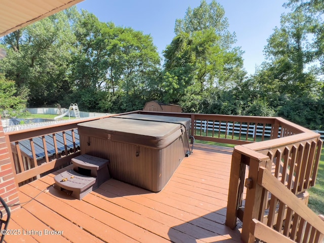 4212 Marseille Dr, Louisville, KY 40272 - wooden deck featuring a hot tub and view of wooded area