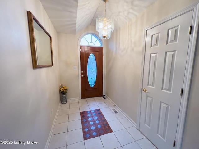 4212 Marseille Dr, Louisville, KY 40272 - foyer with light tile patterned floors and a chandelier
