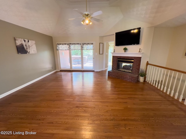 4212 Marseille Dr, Louisville, KY 40272 - unfurnished living room with wood finished floors, ceiling fan, a fireplace, and lofted ceiling