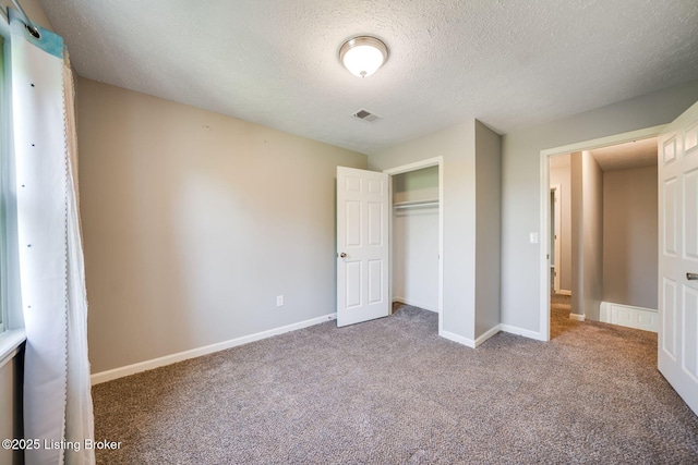 2700 Pioneer Ct, Radcliff, KY 40160 - unfurnished bedroom with a textured ceiling, carpet floors, and a closet