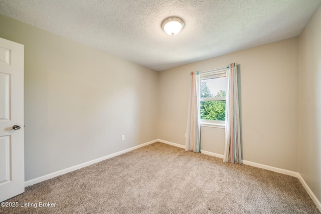 2700 Pioneer Ct, Radcliff, KY 40160 - empty room with carpet and a textured ceiling