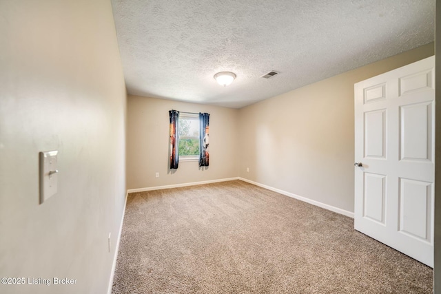 2700 Pioneer Ct, Radcliff, KY 40160 - empty room with carpet and a textured ceiling