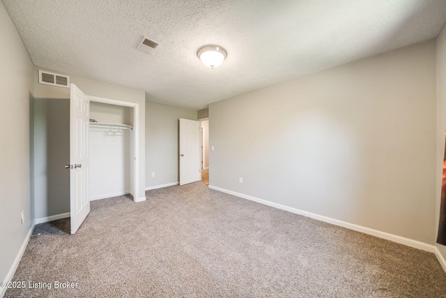 2700 Pioneer Ct, Radcliff, KY 40160 - unfurnished bedroom featuring carpet flooring, a closet, and a textured ceiling