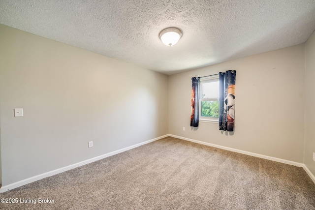 2700 Pioneer Ct, Radcliff, KY 40160 - carpeted empty room featuring baseboards and a textured ceiling