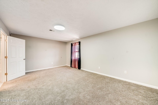 2700 Pioneer Ct, Radcliff, KY 40160 - spare room featuring light colored carpet and a textured ceiling
