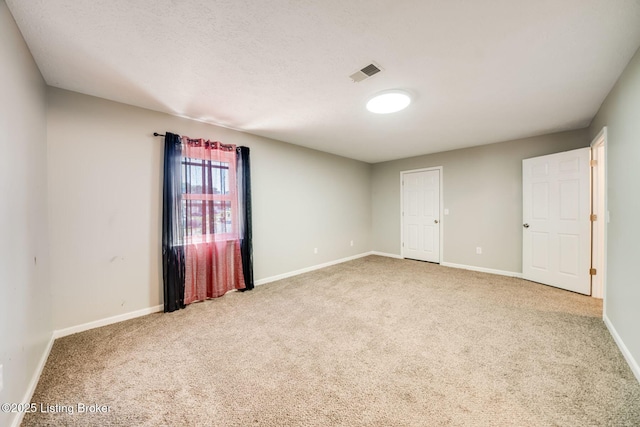 2700 Pioneer Ct, Radcliff, KY 40160 - carpeted empty room featuring baseboards