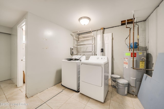 2700 Pioneer Ct, Radcliff, KY 40160 - laundry area featuring water heater, washing machine and clothes dryer, and light tile patterned floors