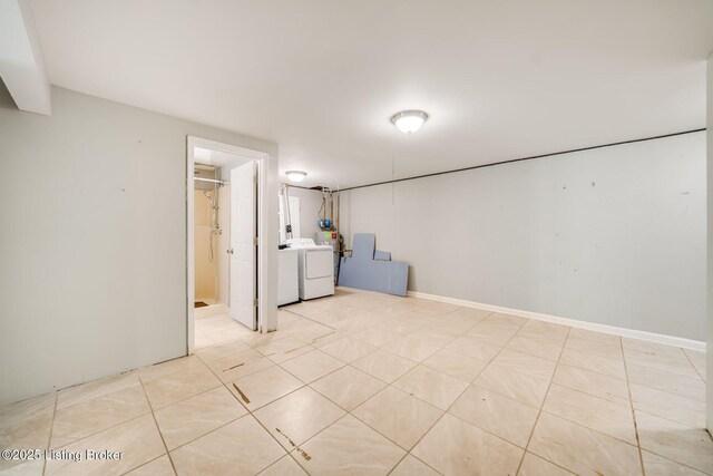 2700 Pioneer Ct, Radcliff, KY 40160 - finished basement featuring washing machine and clothes dryer and light tile patterned flooring