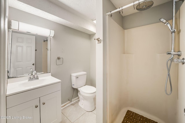 2700 Pioneer Ct, Radcliff, KY 40160 - bathroom featuring a shower, vanity, tile patterned flooring, and a textured ceiling