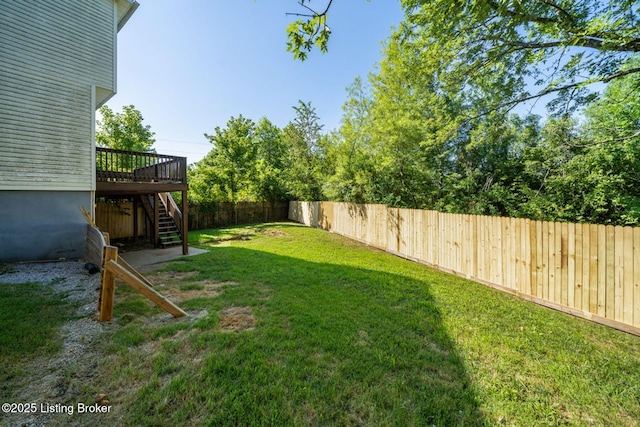 2700 Pioneer Ct, Radcliff, KY 40160 - fenced backyard with stairway and a wooden deck