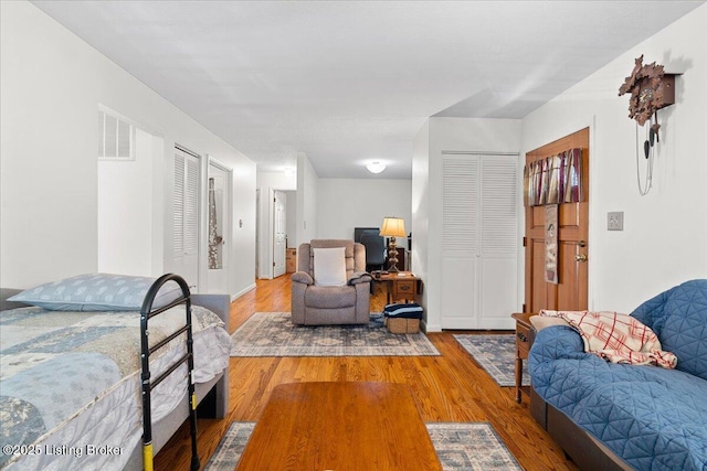 3706 Glenlea Way, Jeffersontown, KY 40299 - bedroom with wood finished floors and multiple closets