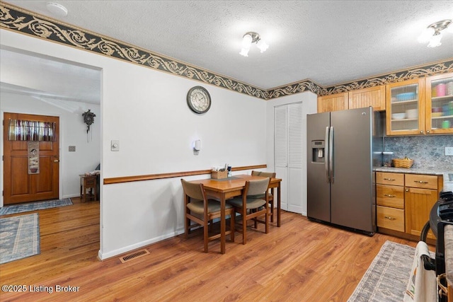 3706 Glenlea Way, Jeffersontown, KY 40299 - dining space with light wood-style flooring and a textured ceiling
