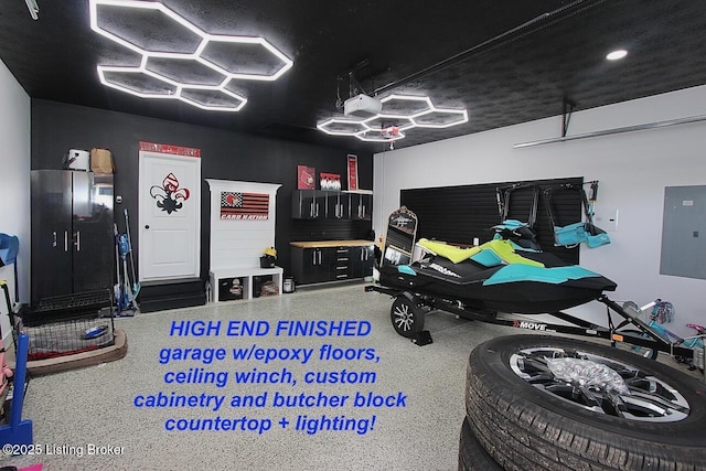 4017 Williams Crossing Way, Jeffersonville, IN 47130 - recreation room with electric panel, a garage, and speckled floor