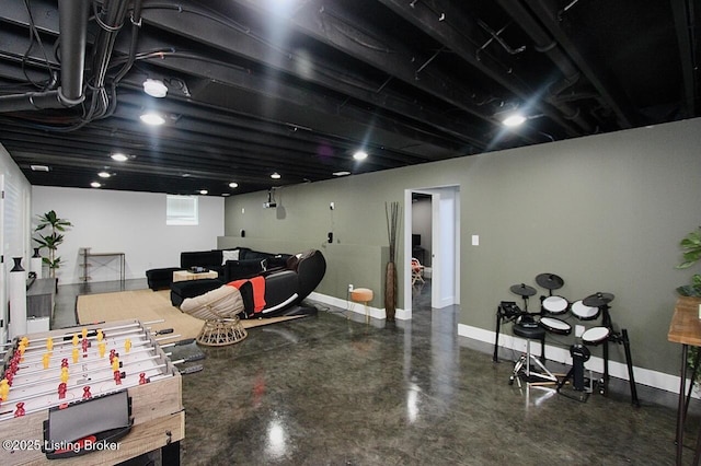 4017 Williams Crossing Way, Jeffersonville, IN 47130 - playroom with baseboards and finished concrete floors