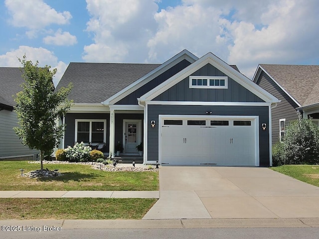 4017 Williams Crossing Way, Jeffersonville, IN 47130 - craftsman-style home featuring board and batten siding, an attached garage, a front lawn, and driveway