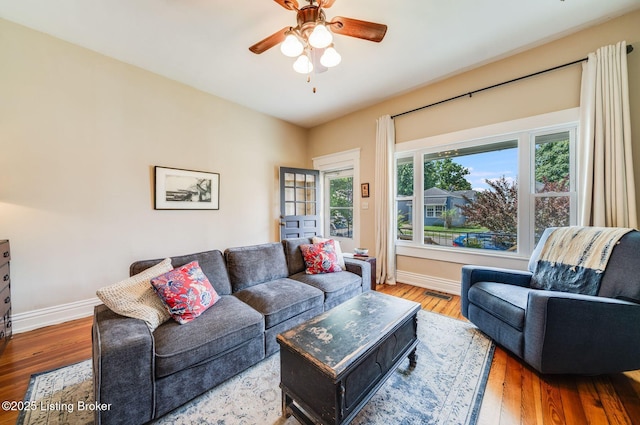 1021 Mulberry St, Louisville, KY 40217 - living room with a ceiling fan and wood finished floors
