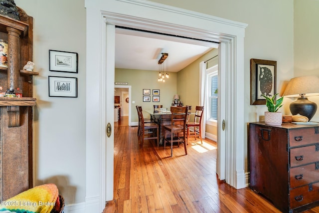 1021 Mulberry St, Louisville, KY 40217 - dining room featuring hardwood / wood-style flooring and baseboards