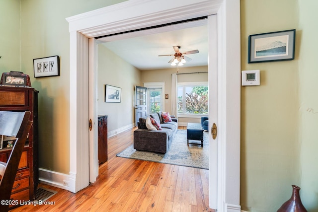 1021 Mulberry St, Louisville, KY 40217 - corridor featuring baseboards and light wood-style flooring