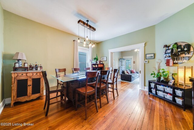 1021 Mulberry St, Louisville, KY 40217 - dining space featuring hardwood / wood-style flooring and baseboards