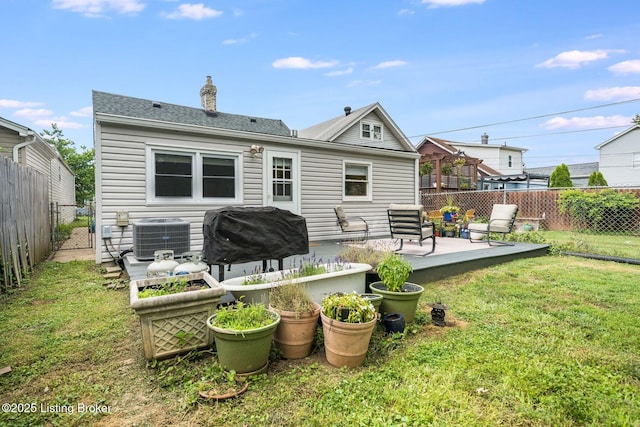 1021 Mulberry St, Louisville, KY 40217 - back of house featuring a fenced backyard and a patio area
