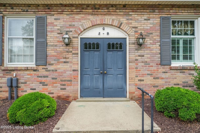 521 Zorn Ave Apt G8, Louisville, KY 40206 - doorway to property featuring brick siding