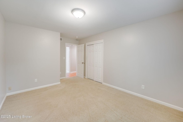 521 Zorn Ave Apt G8, Louisville, KY 40206 - unfurnished room with light carpet and baseboards