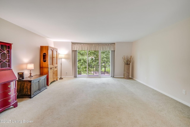 521 Zorn Ave Apt G8, Louisville, KY 40206 - unfurnished living room featuring light carpet