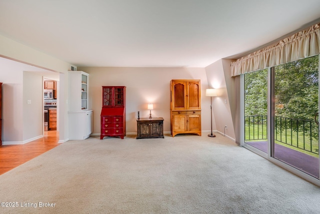 521 Zorn Ave Apt G8, Louisville, KY 40206 - living area with light colored carpet and baseboards