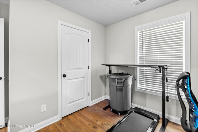 112 Shallow Springs Ct, Bardstown, KY 40004 - exercise room with wood finished floors and baseboards
