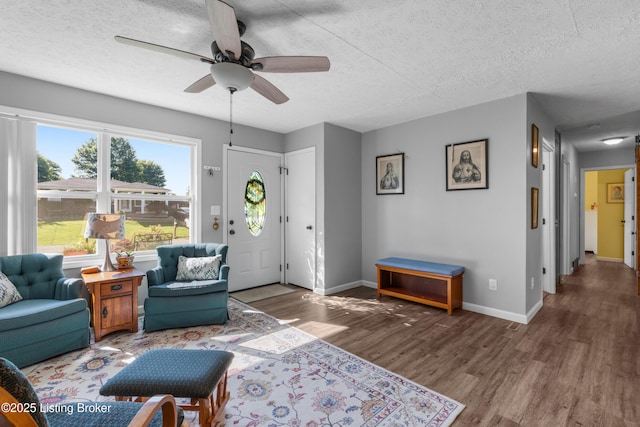 166 Glenview Rd, Shepherdsville, KY 40229 - living area with wood finished floors, a textured ceiling, and ceiling fan