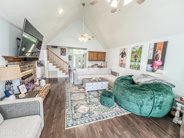 173 Megan Way, Falls Of Rough, KY 40119 - living area featuring a ceiling fan, wood finished floors, lofted ceiling, stairs, and a brick fireplace