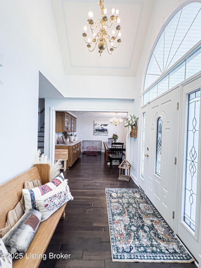 173 Megan Way, Falls Of Rough, KY 40119 - entrance foyer featuring a chandelier, dark wood-type flooring, and a towering ceiling