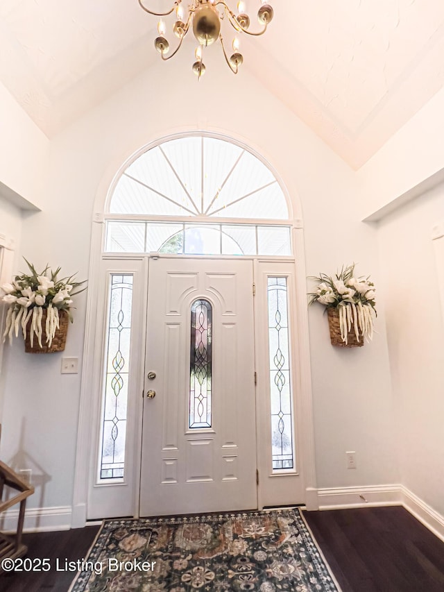 173 Megan Way, Falls Of Rough, KY 40119 - entrance foyer featuring a chandelier, dark wood-type flooring, and high vaulted ceiling
