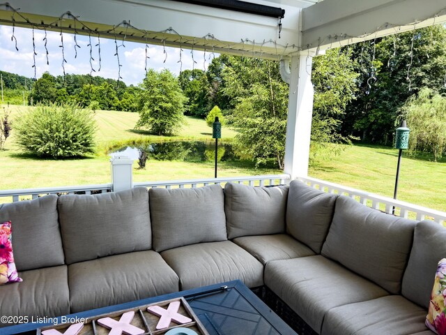 173 Megan Way, Falls Of Rough, KY 40119 - view of patio / terrace featuring an outdoor living space, view of wooded area, and a water view