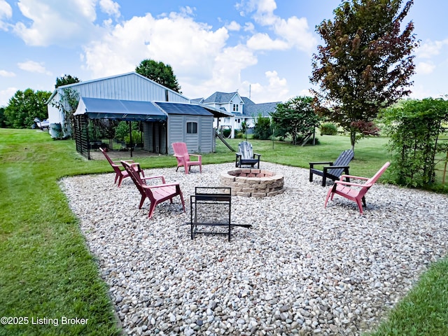 173 Megan Way, Falls Of Rough, KY 40119 - view of patio / terrace featuring an outdoor fire pit