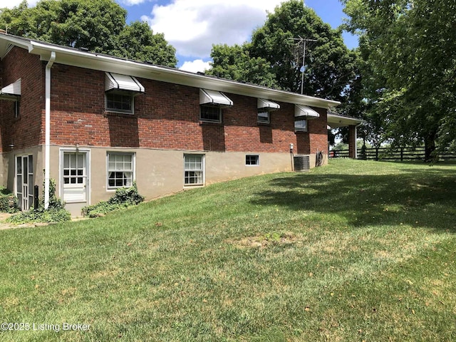 1600 Normandy Rd, Taylorsville, KY 40071 - view of property exterior with brick siding and a central AC unit