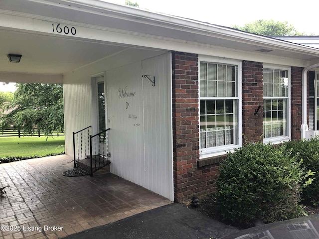 1600 Normandy Rd, Taylorsville, KY 40071 - doorway to property with brick siding