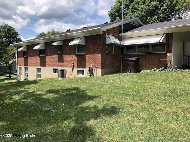 1600 Normandy Rd, Taylorsville, KY 40071 - view of property exterior with brick siding and a yard