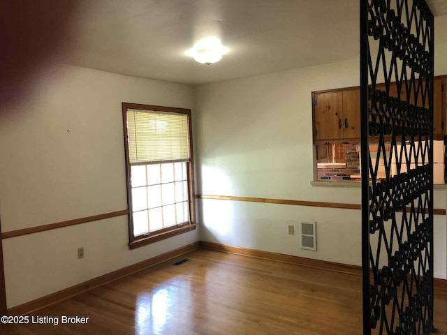 1600 Normandy Rd, Taylorsville, KY 40071 - unfurnished room with wood finished floors and baseboards