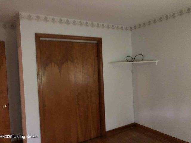 1600 Normandy Rd, Taylorsville, KY 40071 - unfurnished room with baseboards and dark wood-type flooring