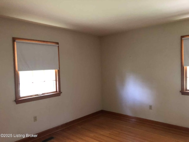 1600 Normandy Rd, Taylorsville, KY 40071 - unfurnished room featuring wood finished floors and baseboards