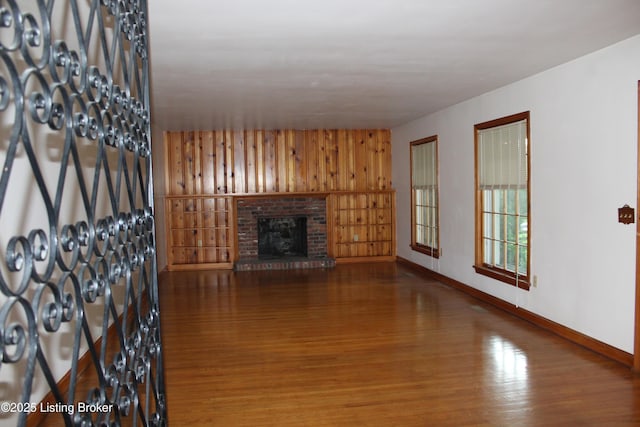 1600 Normandy Rd, Taylorsville, KY 40071 - unfurnished living room with wood finished floors and a fireplace