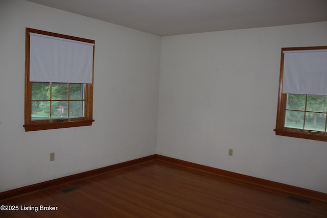 1600 Normandy Rd, Taylorsville, KY 40071 - spare room featuring wood finished floors and baseboards